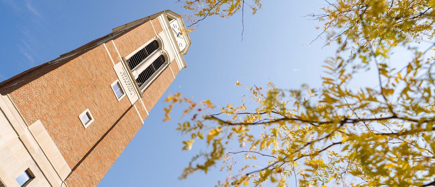 A photo from below, looking up at the Elliott Tower.